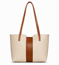 Beige and black color block shoulder bag with double handle
Brown color block tote bag – side view