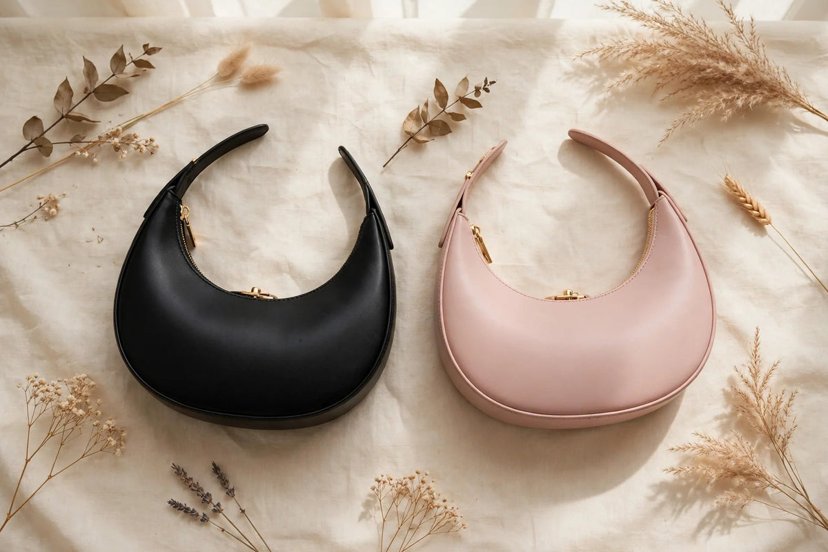 Black and blush pink crescent handbags